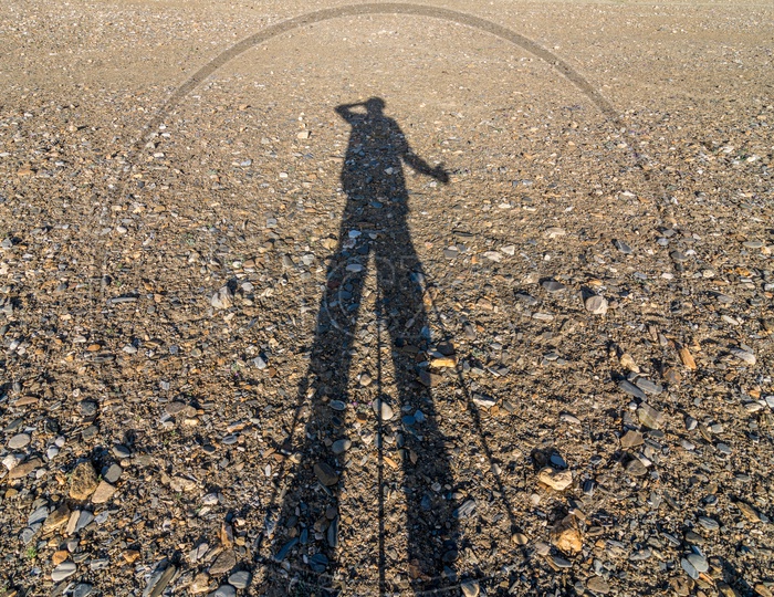 Shadow of a man with Tripod