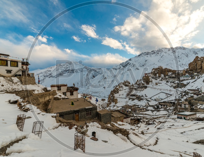 Dhankar Village Covered with Snow and Clouds in Sky Background