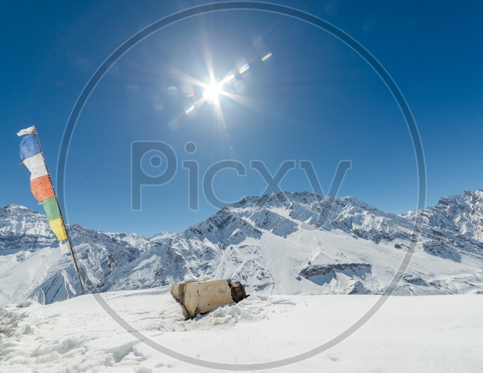Sun star burst in Snow Capped Himalayan Mountains
