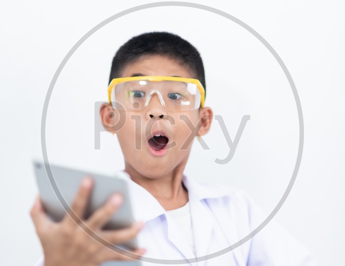 Young Asian Boy enjoying learning in the laboratory