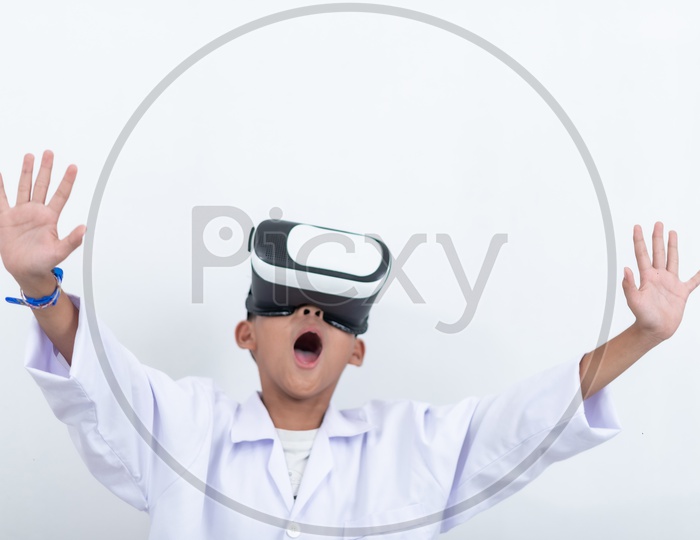 Happy teen Asian boy with  virtual reality watching movies