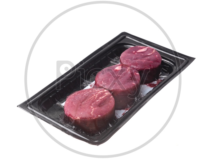 raw beef in a Pan  isolated on white background