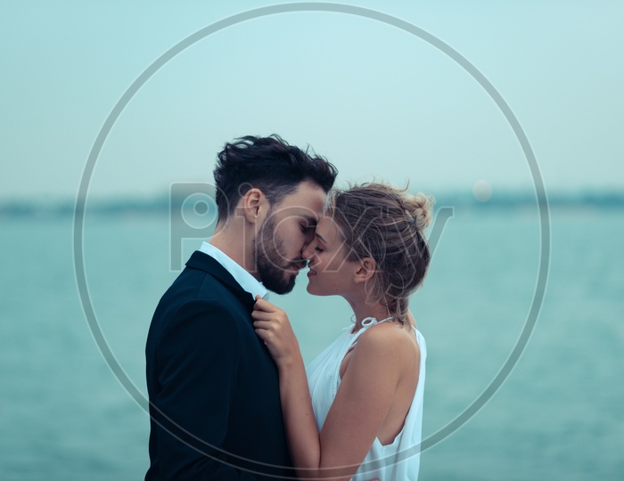Love scene of newly married couple on a luxury yacht