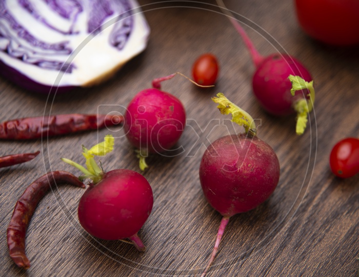 Beetroot And Dried Pepper On Wooden Board