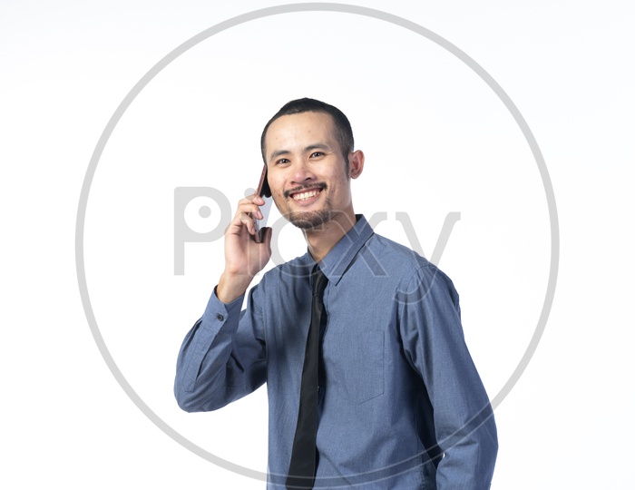 Employee Or Professional Business Man Speaking In Smartphone Over Isolated White Background