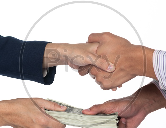 Money Transfer Between Business man With a Deal Concept