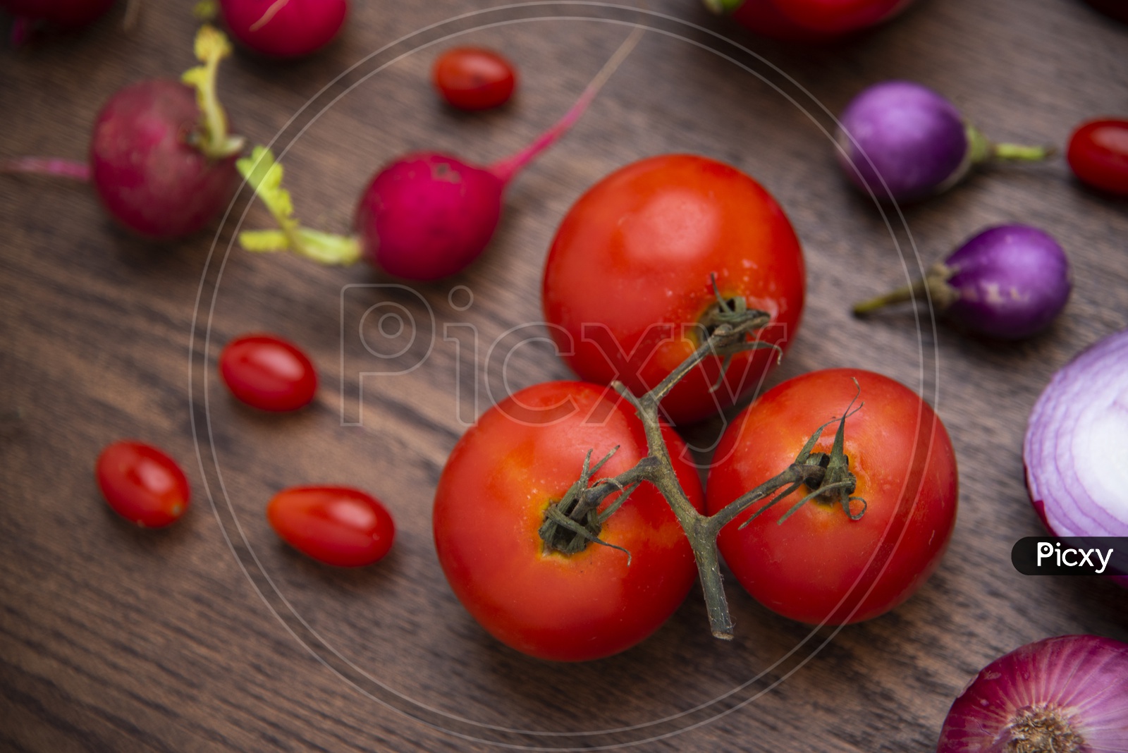 red vegetables set on wooden background