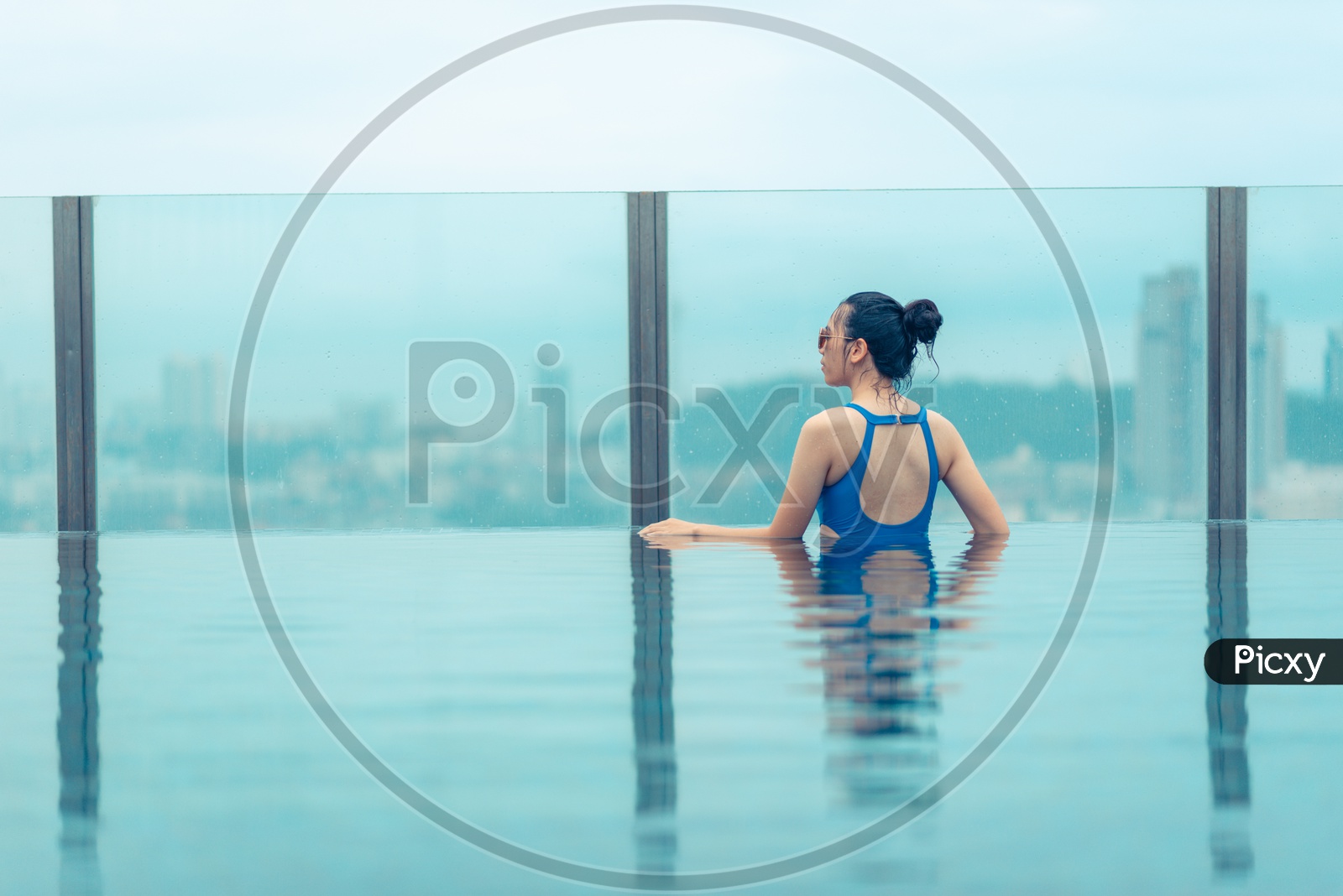 Swimming pool on roof top with beautiful city view, Pattaya, Thailand