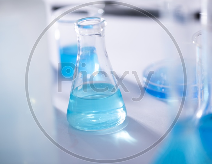 Laboratory glassware containing chemical liquid