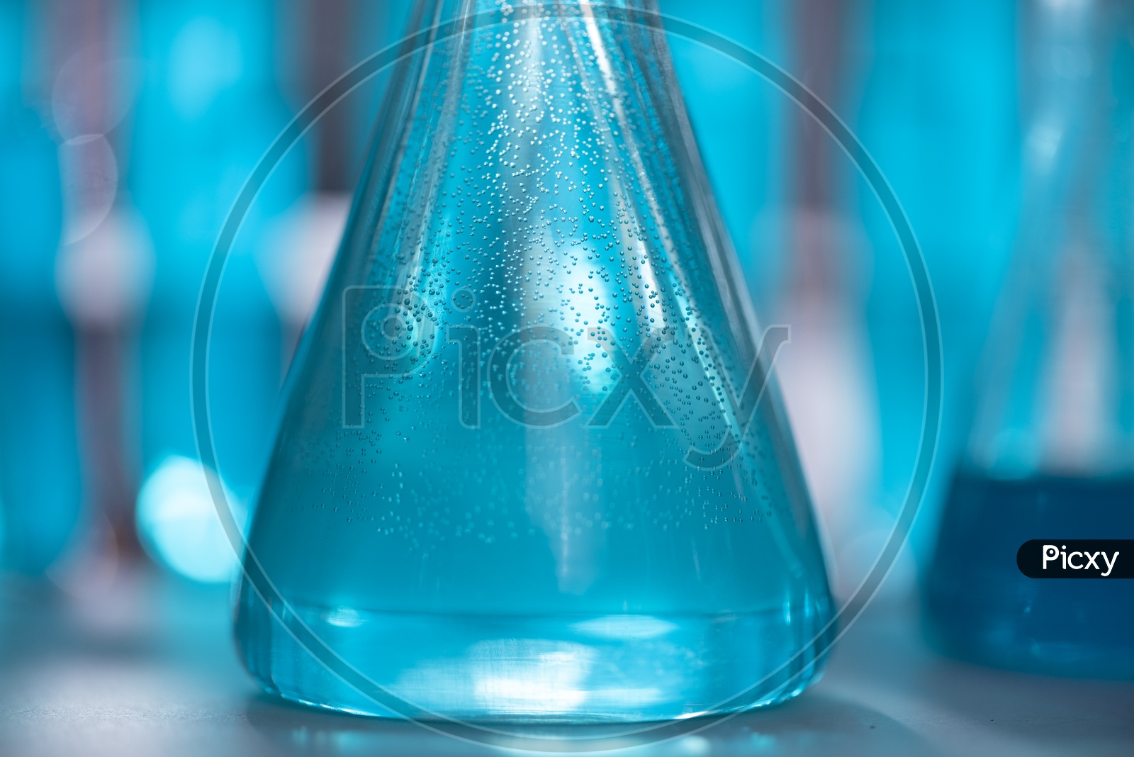 A Conical Flask with blue solution