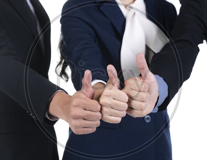 Thumbs up Gesture Of a  Young Business team  Celebrating success By Team Work