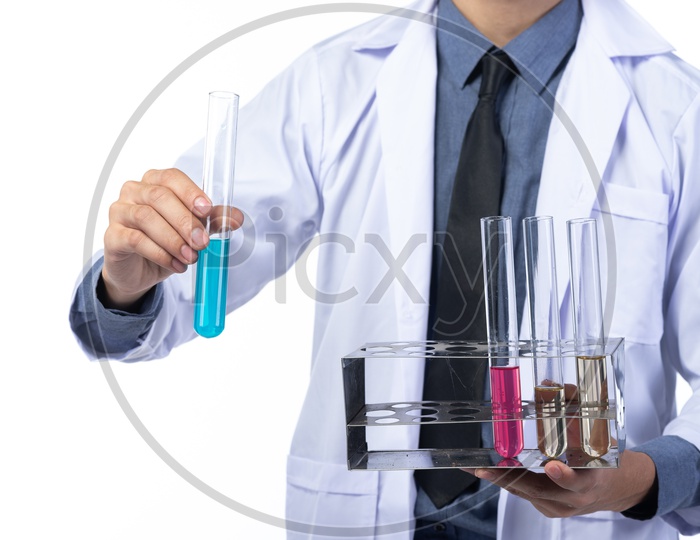 Laboratory Test Tubes With Chemicals  On the Hands of a Research Student