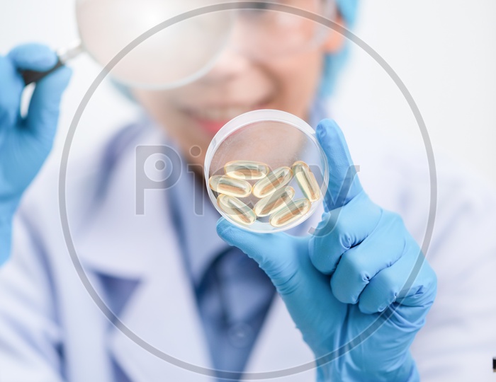 A Female Scientist analyzing alternative herb medicine in the laboratory