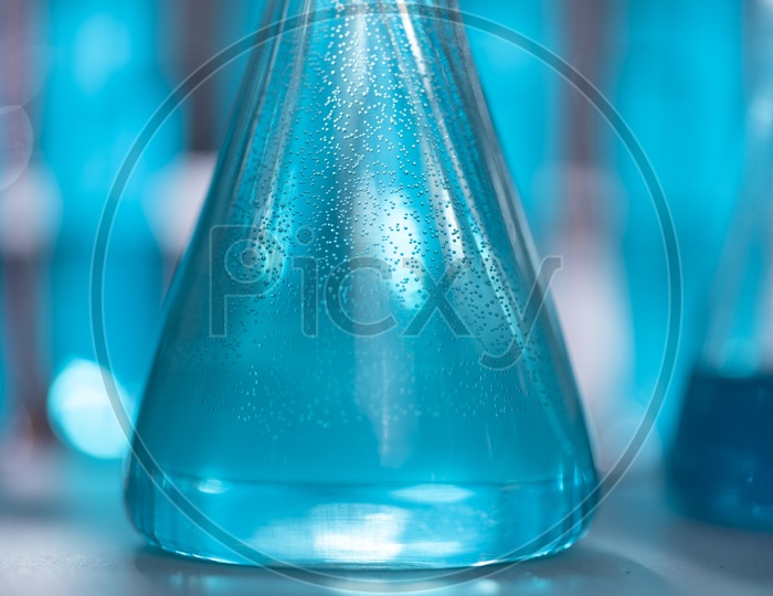 A Conical Flask with blue solution