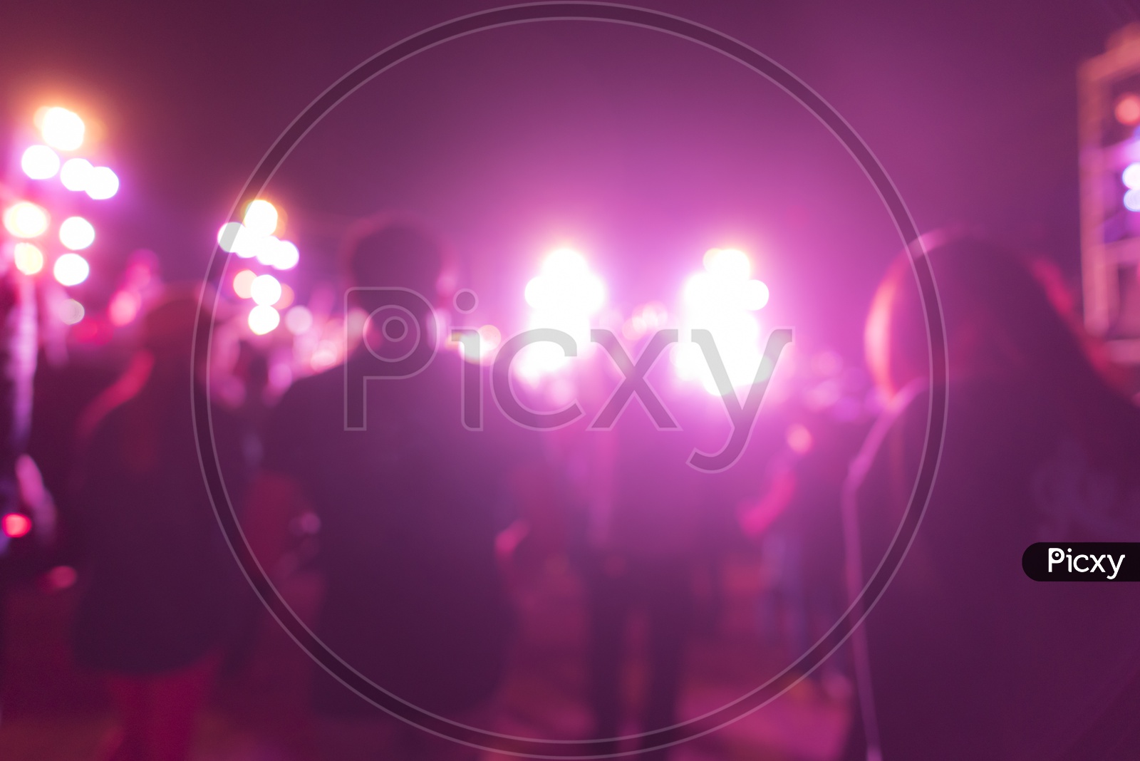 party in a pub, blurry image With Pink Colour Palate