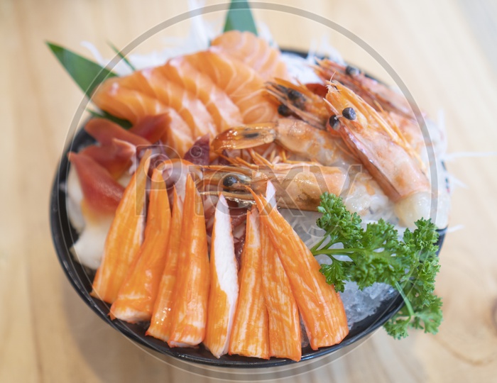 salmon shashimi japanese raw food with wasabi and greenleaf , Japanese Food served in restaurants
