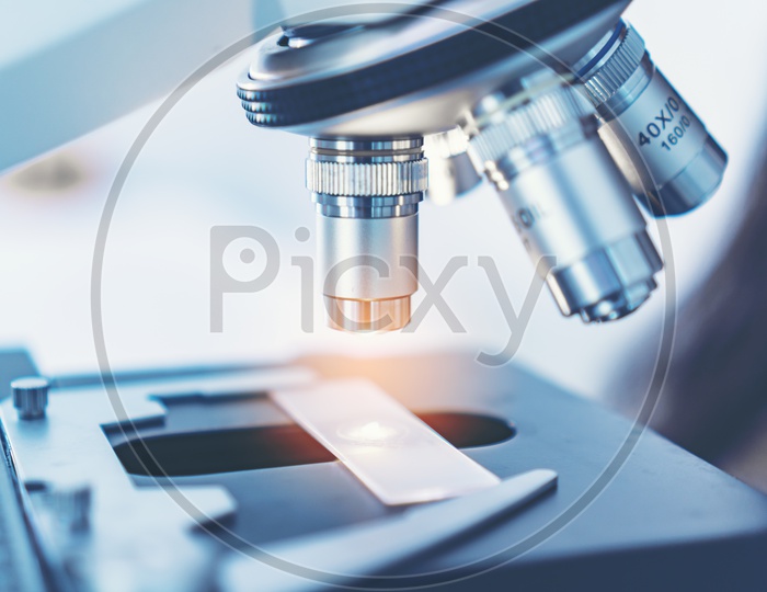 Medical Analysis or Research In a Laboratory Using Microscope With Glass Sample Tile For Analyze