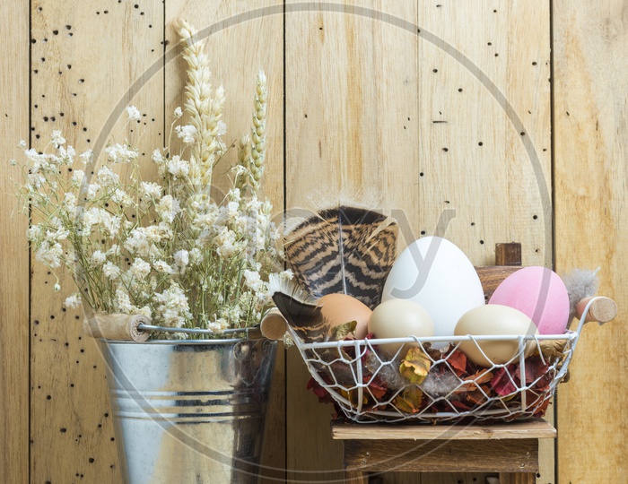 Artistic Backgrounds For Easter Festival With Bunch of Colorful Eggs over Wooden Background
