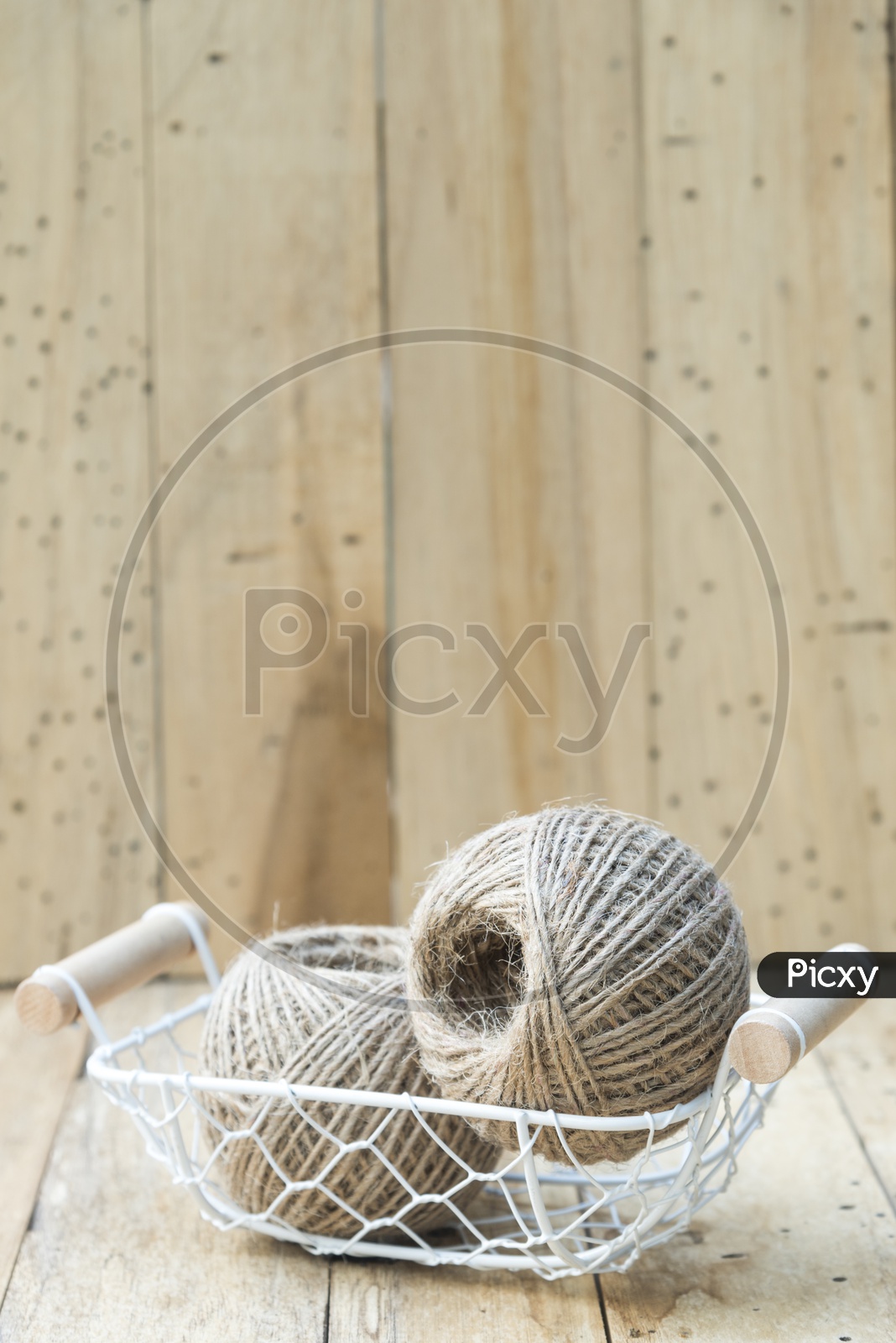 Basket With Vintage Rope Roll  Over Isolated Background