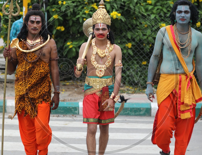 Artists in Indian Mythology Gods Makeup Crossing Road at Zebra Crossing
