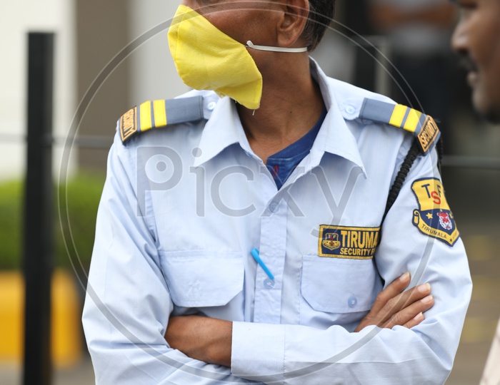 Security Guard with Pollution Mask