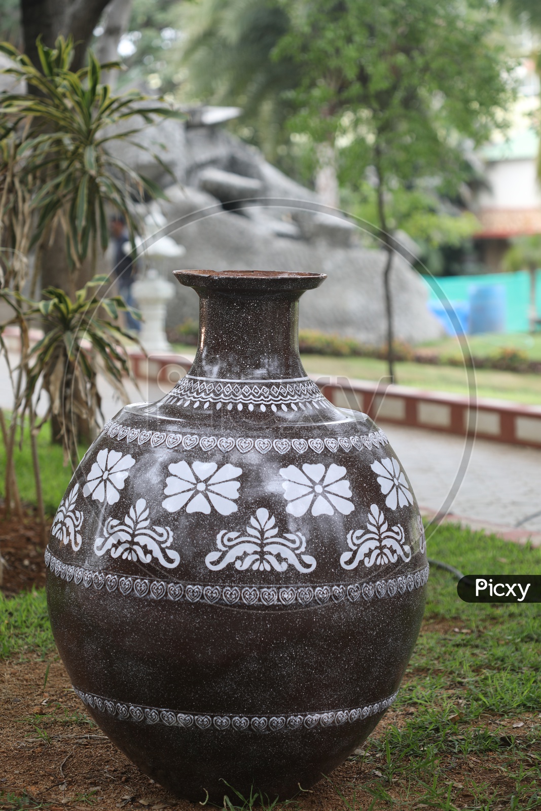 Image of a Big Pot With Design In a Lawn Of a Park-RH012108-Picxy