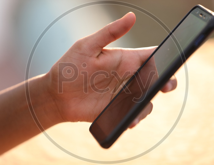 Woman Girl Fingers On  Smartphone Screen Using  Smartphone  Hand Closeup
