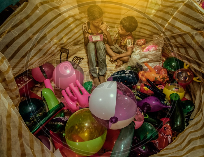 two kids selling toys