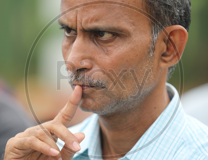 Indian Man With an Expression  Thinking  Closeup