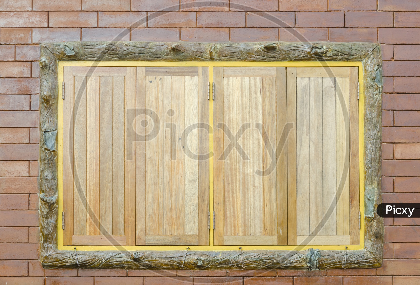 Brown wooden window on brick wall Abstract Background
