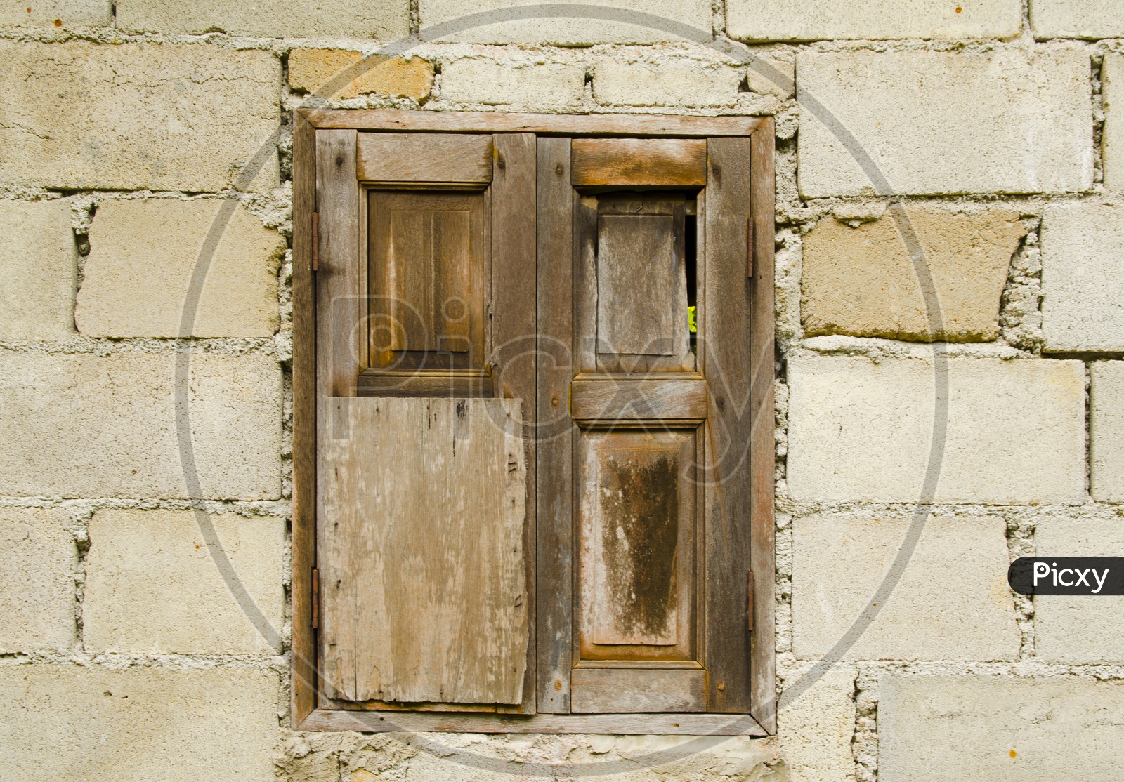Vintage wooden window of a wall