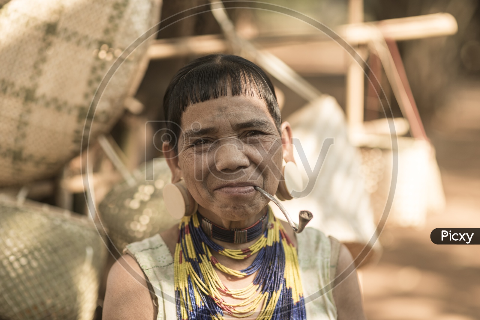 Portrait of  Alak tribe woman in village near plateau Bolaven, Laos