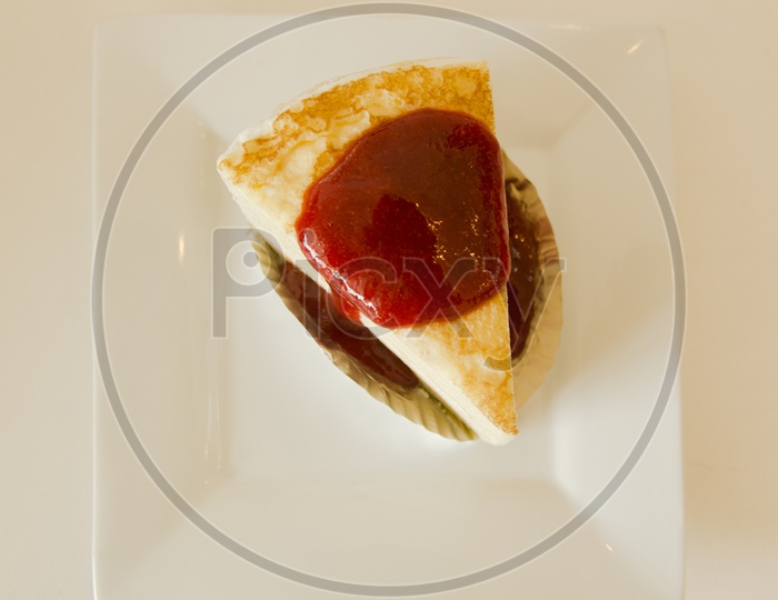 A cheesecake served with sauche in Thai Cafe