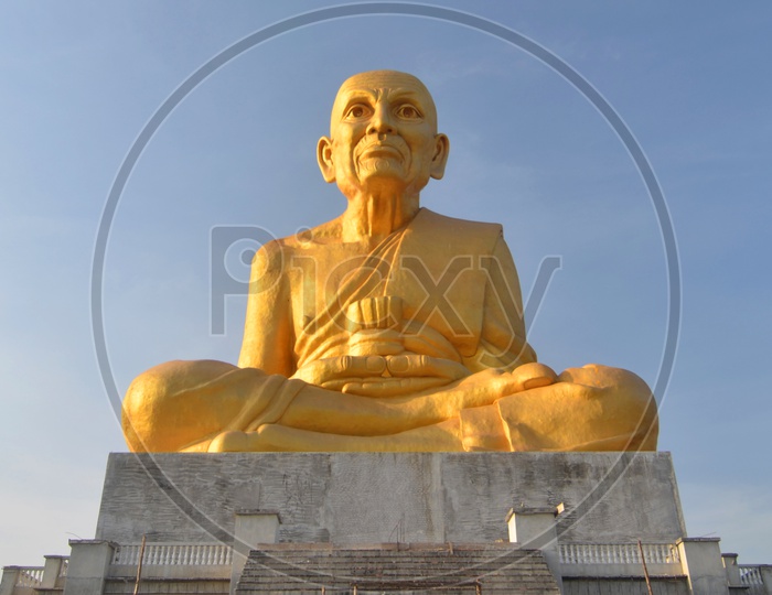 Big Golden Buddha Statue with sky in Thailand