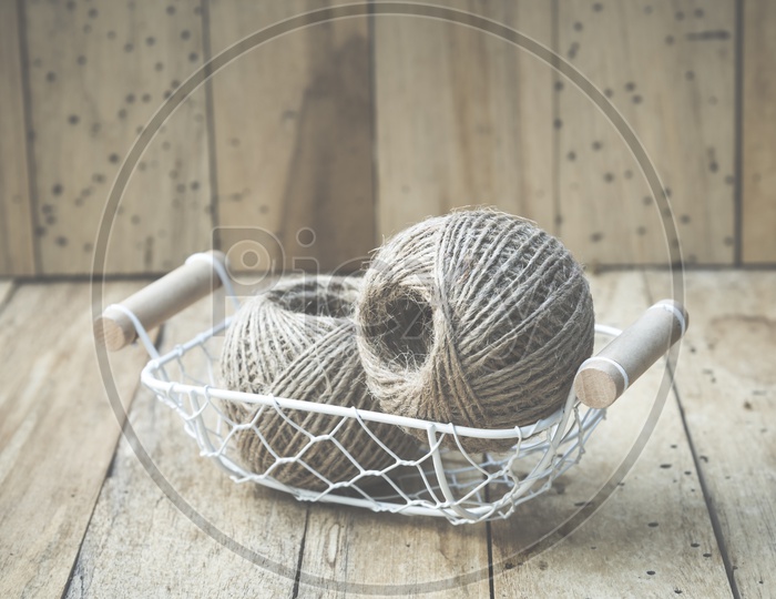 Sieve Thread Roll In an Basket On an Wooden Background