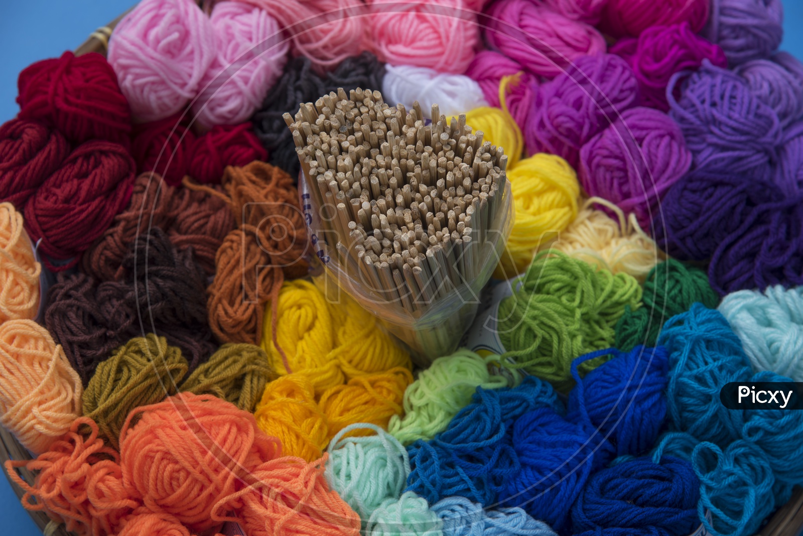 Colorful yarn with knitting sticks