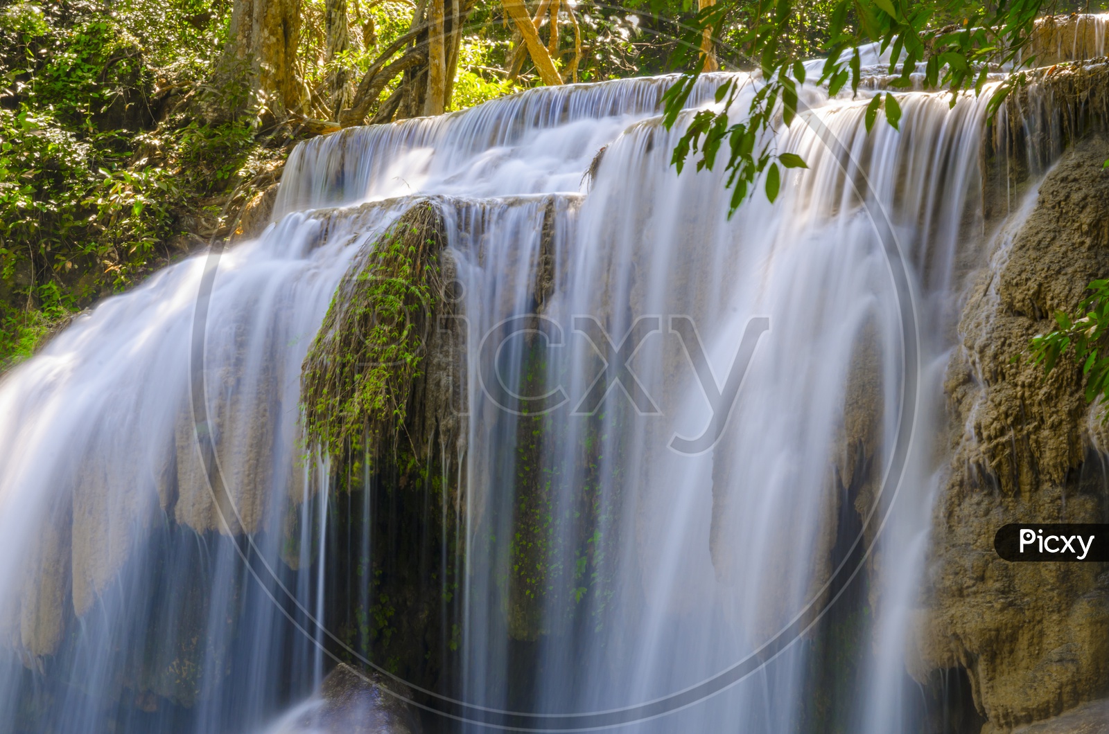 Long Exposure Of Erawan Waterfalls With Smooth Water Flowing Texture