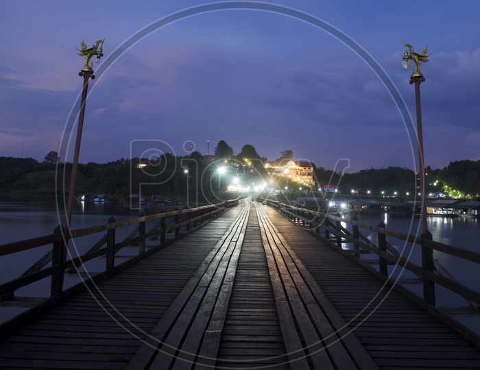 A long wooden bridge during evening at Sangklaburi, Kanchan aburi province, Thailand