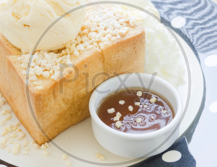 Honey Toast bread topped with honey and ice cream