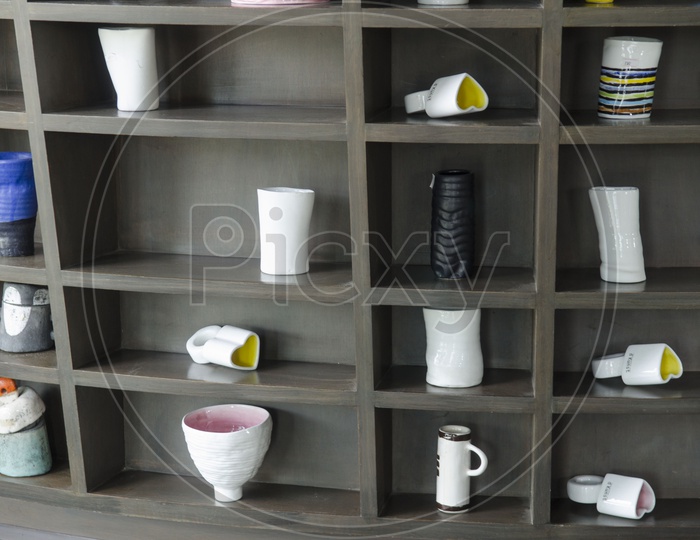 ceramic pots collection In a Cupboard