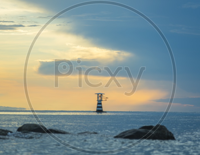 A Lighthouse during sunset in Thailand
