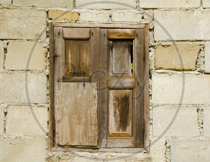 Vintage wooden window of a wall