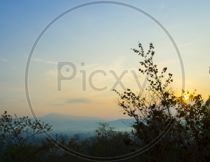 Panorama View Of Sunset Over  Pha Deaw Dai Cliffs of The Khao Yai National Park in Thailand