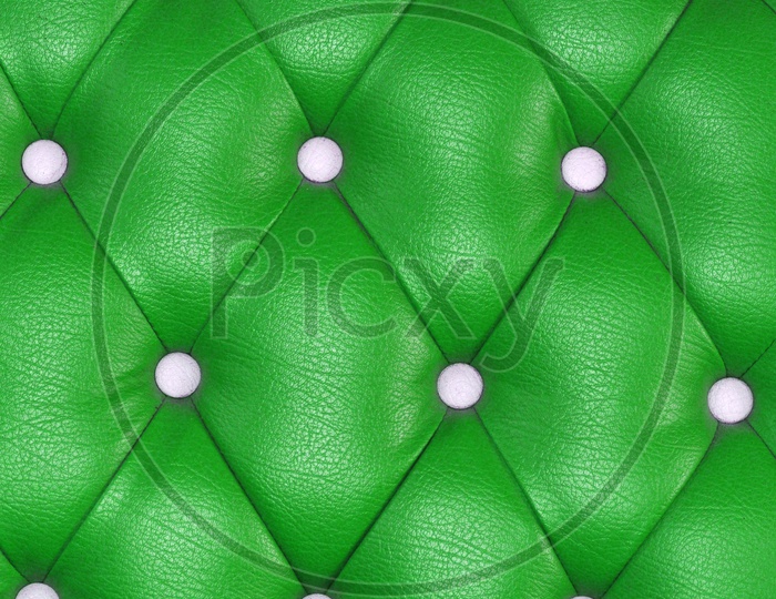 Texture of green blue leather of sofa background