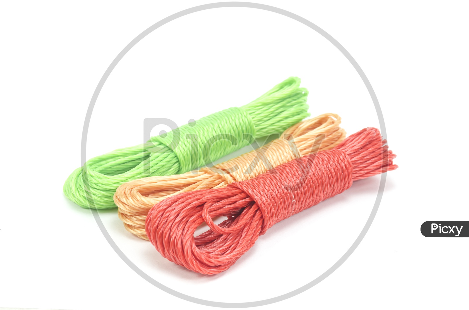 bundles of colorful nylon ropes on white background