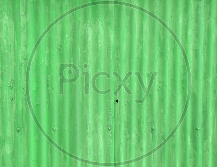 Rusty corrugated iron metal fence Zinc wall texture background, Green color