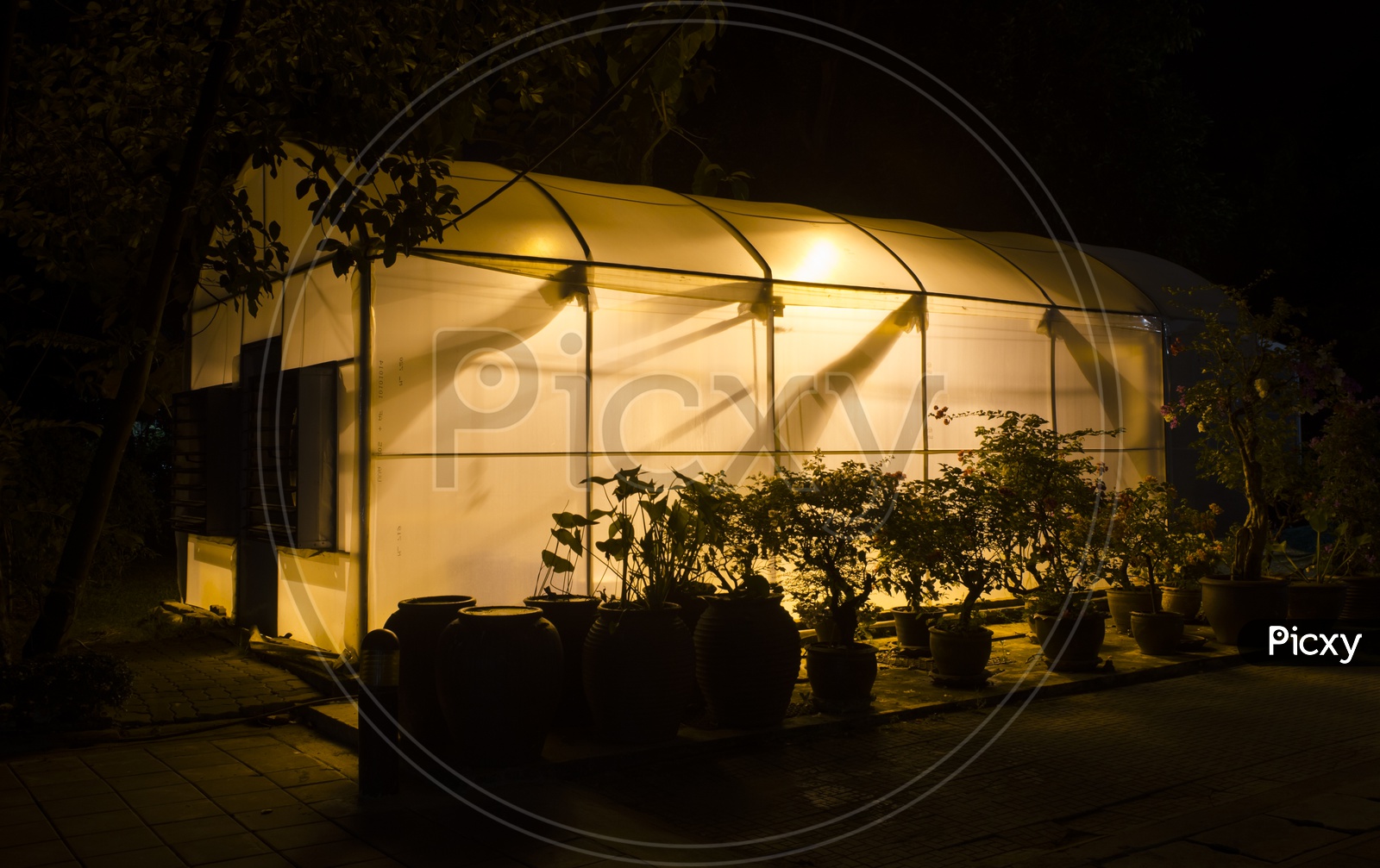 A research greenhouse at university campus of Thailand