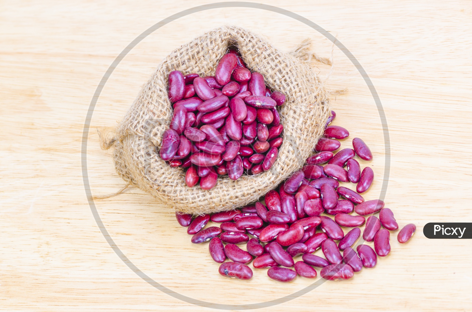 Purple colored beans in sack