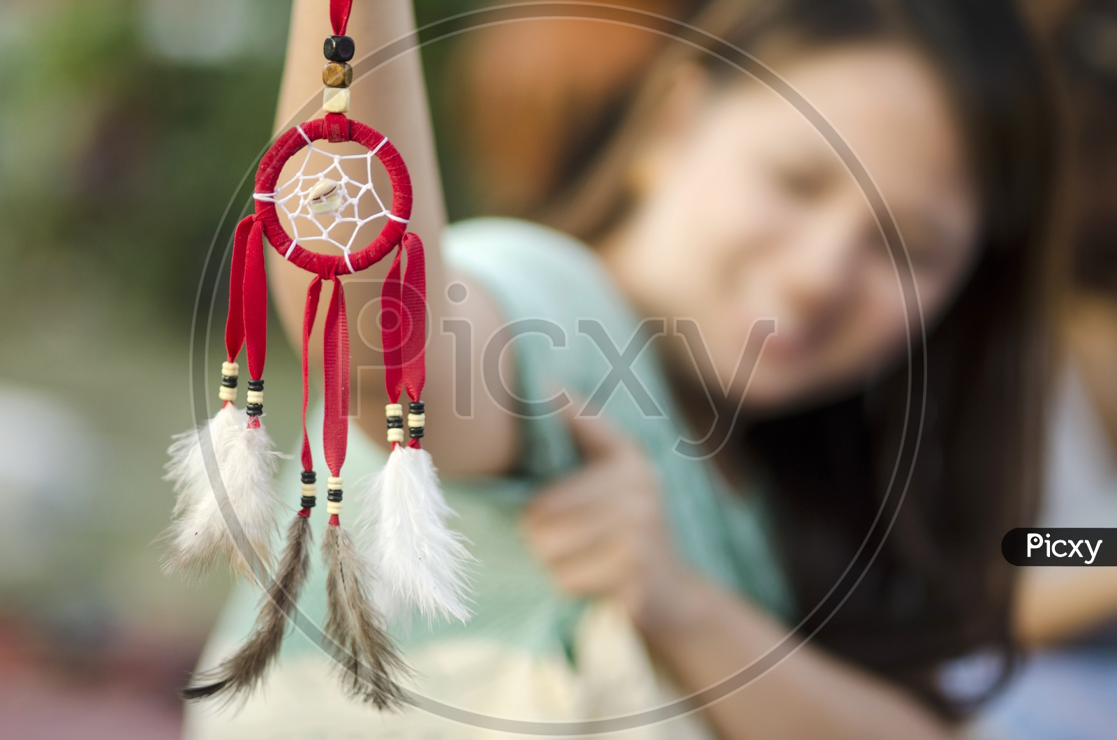 Woman Holding Dream Catcher With Selective Focus