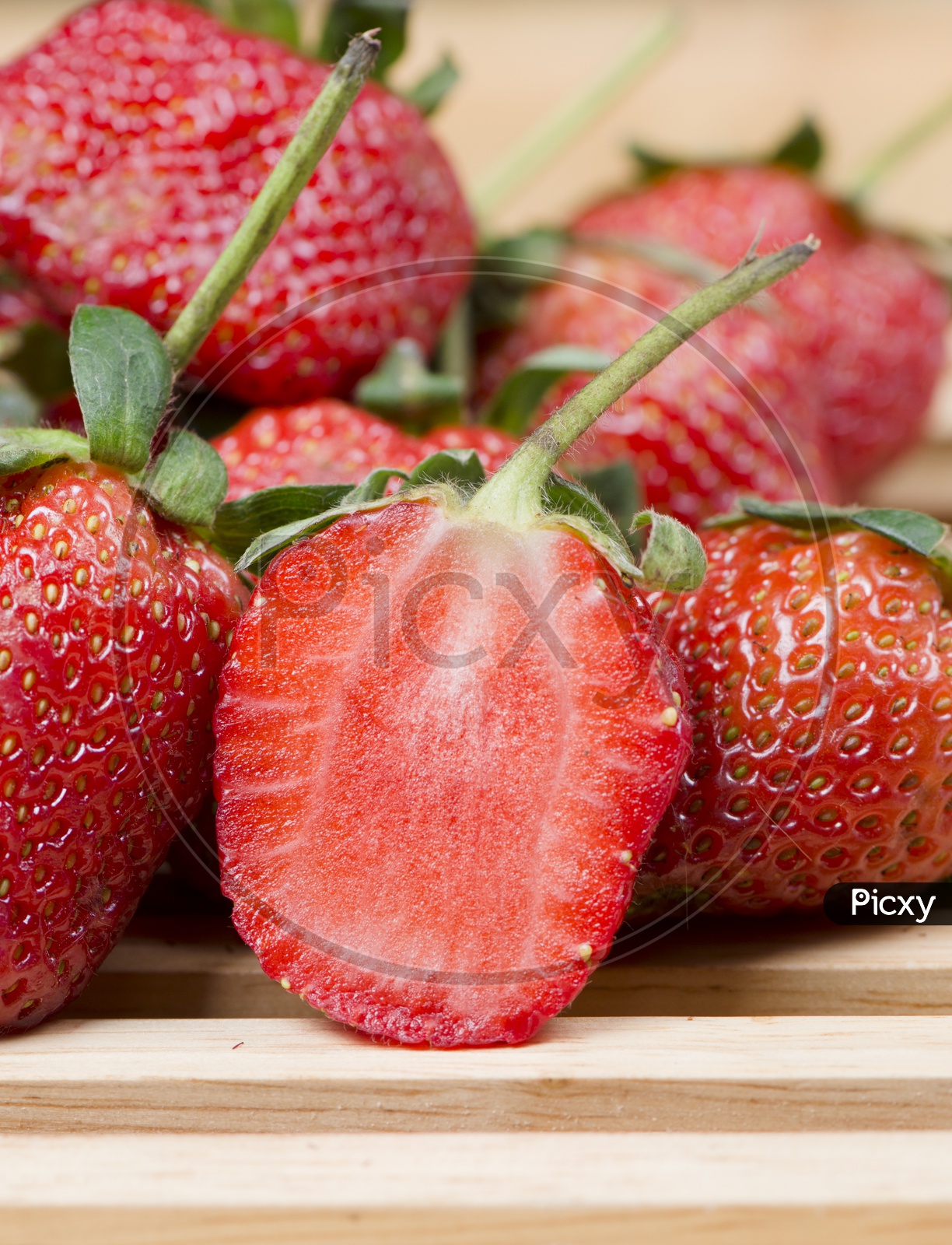 Yummy Strawberries on Wooden Background